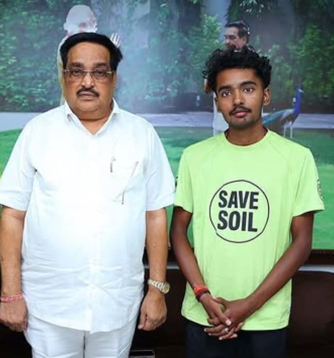 Sahil Jha in a Save Soil T-shirt with C. R. Patil in Surat