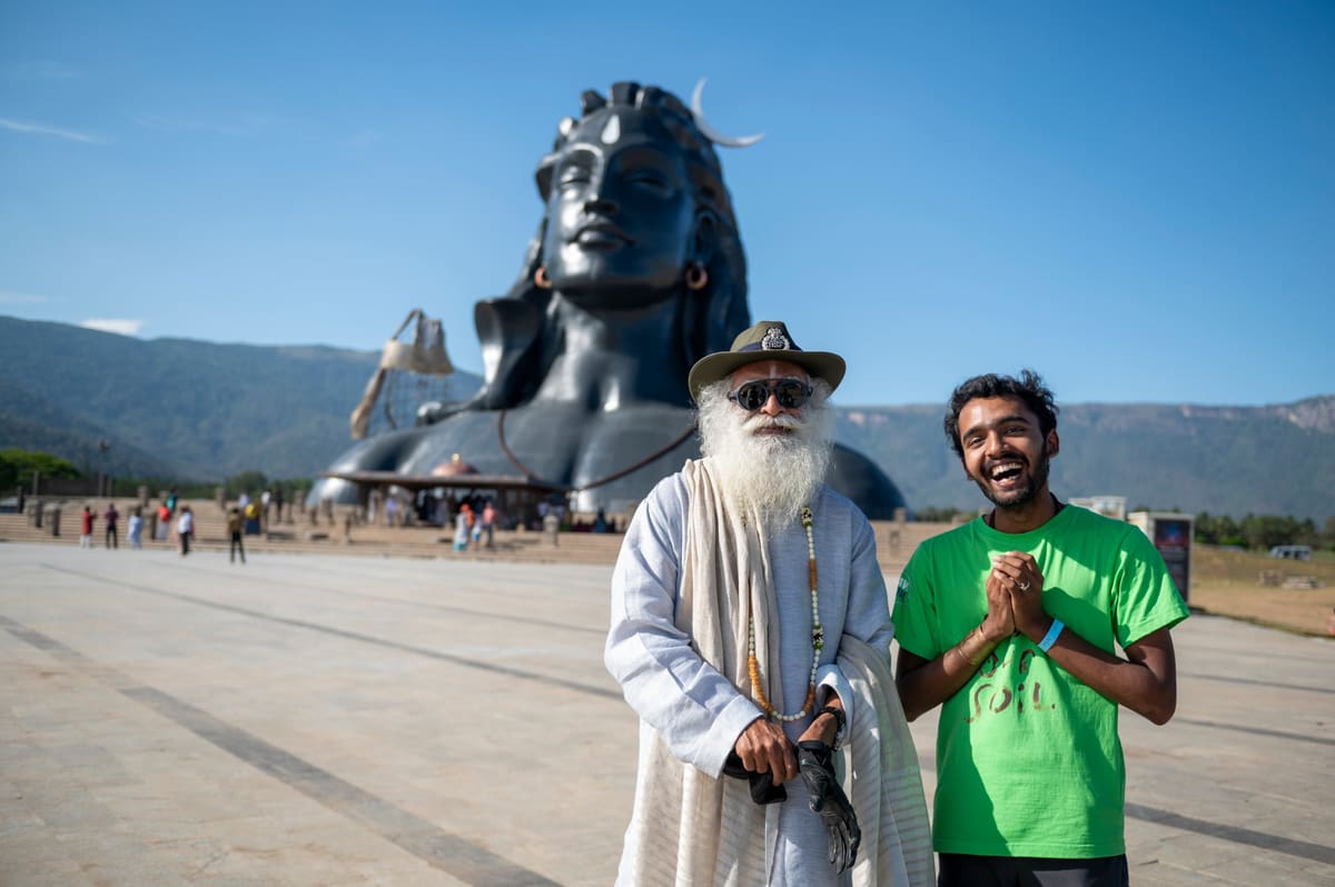 Sahil Jha with Sadhguru in front of the Adiyogi statue at the Isha Yoga Center, Coimbatore